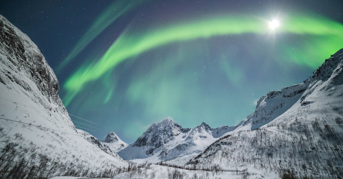 capture the breathtaking beauty of the northern lights in alaska and immerse yourself in a mesmerizing display of natural wonder.